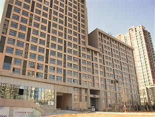 Sweetome Vacation Rentals Pollex Plaza Циндао Экстерьер фото